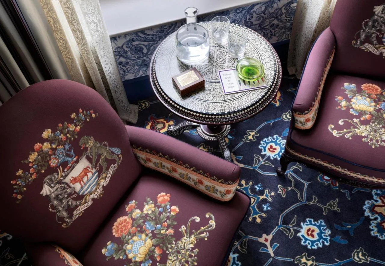 Table and chairs with a tray of food at The Randolph Hotel Oxford